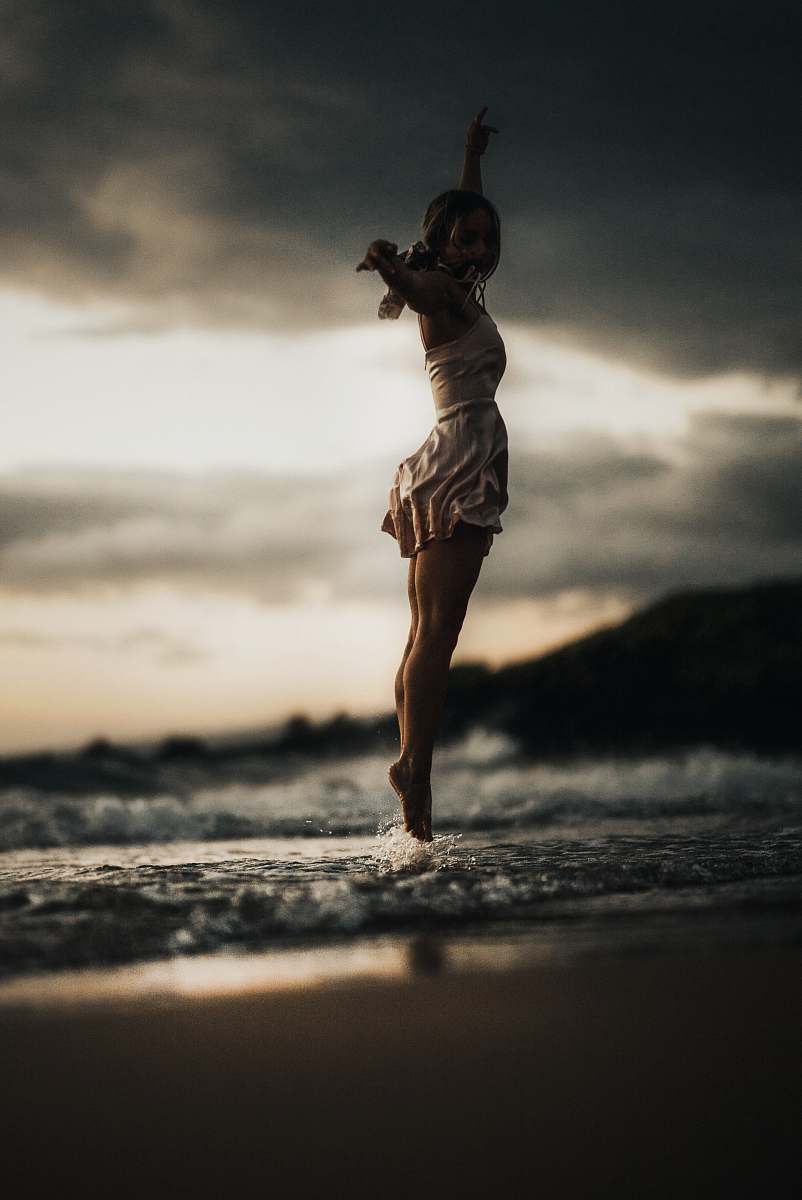 united states selective focus photography of woman jumps into water dance